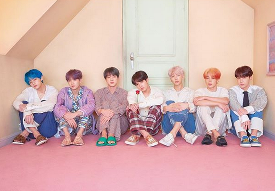 Imej berkaitan industri hiburan K-Pop Korea Selatan dan kesannya terhadap ekonomi.