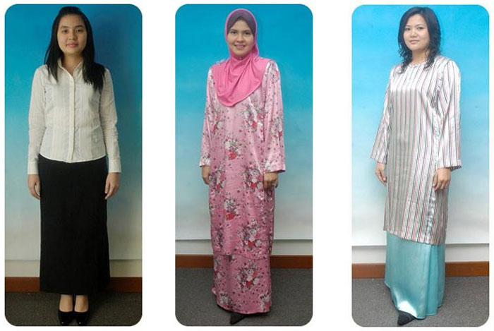 Wanita berpakaian formal pejabat yang kemas dan bersaiz tepat
